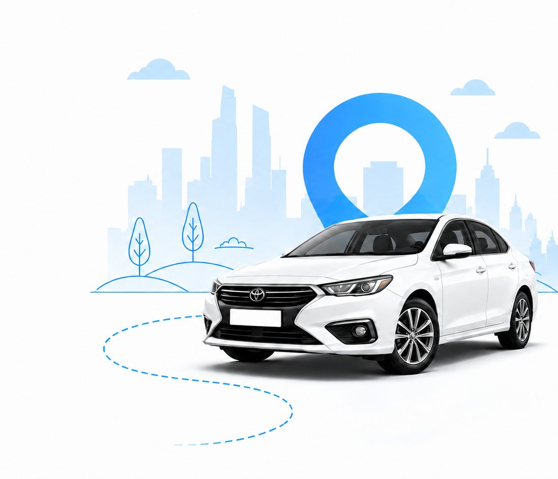 A white sedan ready for pickup, with a city skyline behind it